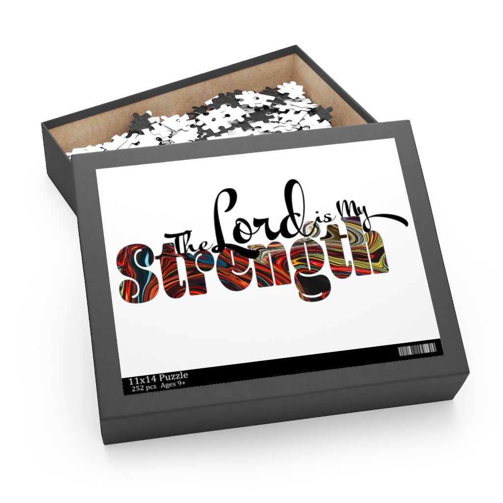 Christian Word Art jigsaw puzzle featuring 'The Lord is My Strength' in vibrant colors, made of high-quality chipboard.